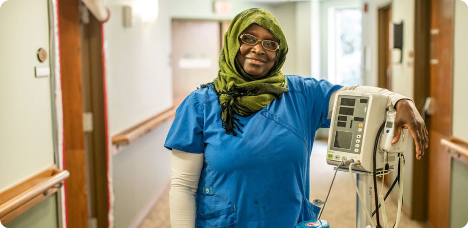 Nurse standing on hospital corridor